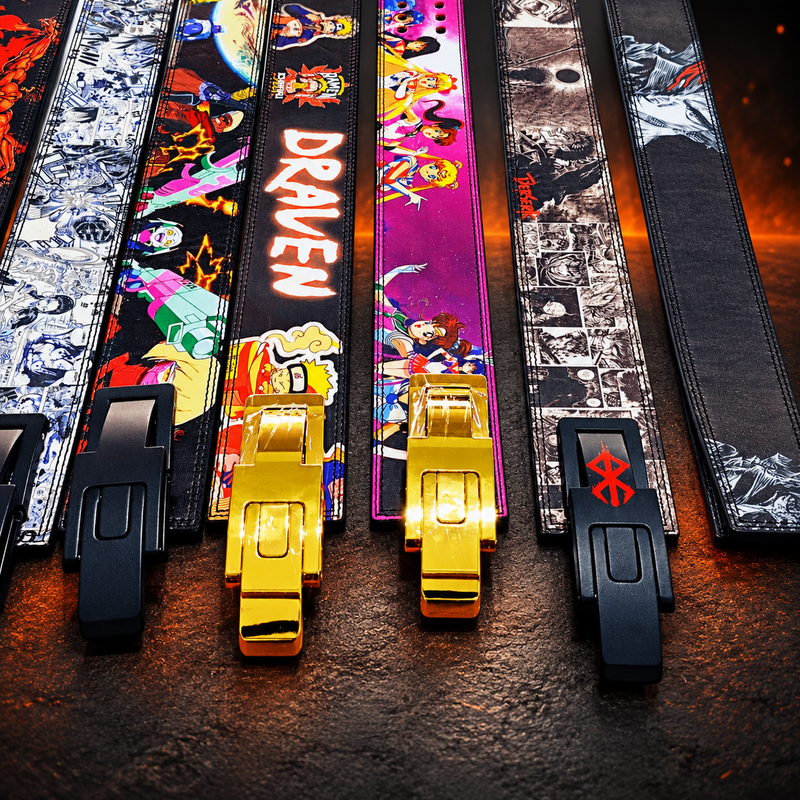 Custom printed powerlifting lever belts from past orders in a row, with comic panels, characters and a name.