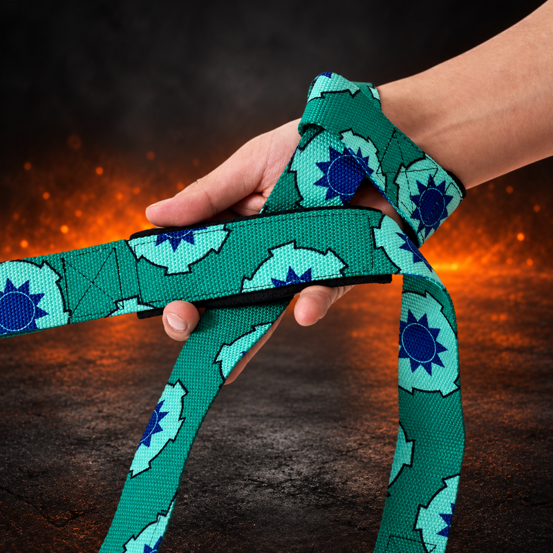 Hand wrapped in the Kiku lifting straps, teal-green webbing printed with mint chrysanthemum crests and dark blue centers