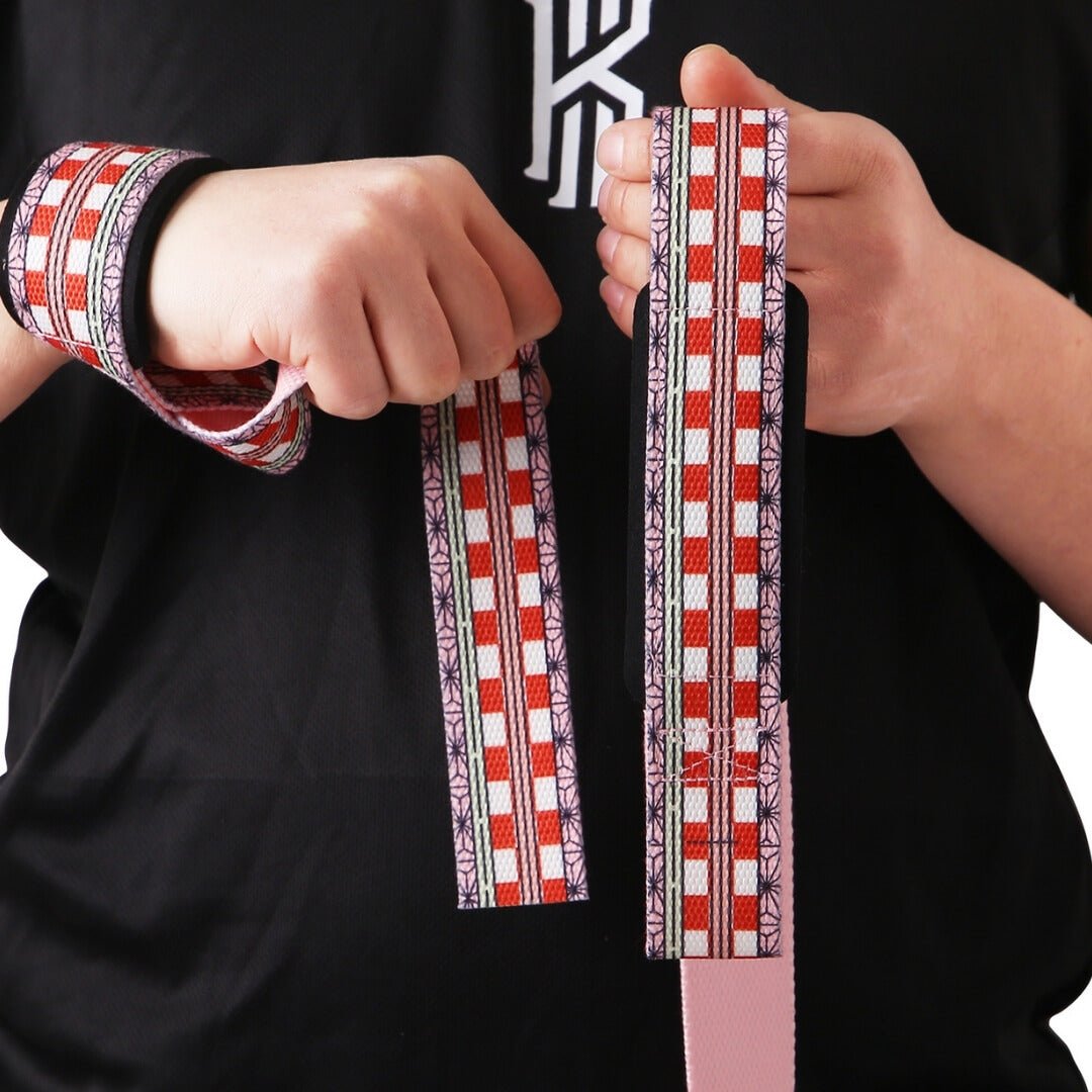 Model showing off Demon Slayer Anime Lifting Straps | Weightlifting straps for a stronger grip on barbell for deadlifts and cleans