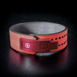 Pink leather weightlifting belt. Pink lever on powerlifting belt