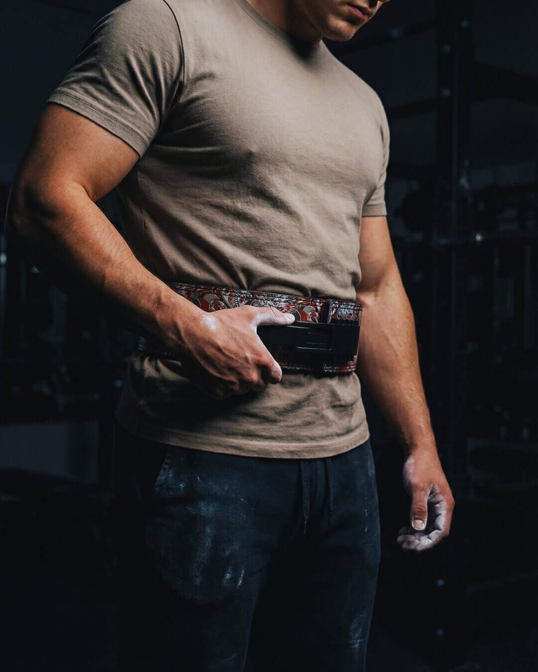 model with weightlifting belt for strength training and powerlifting