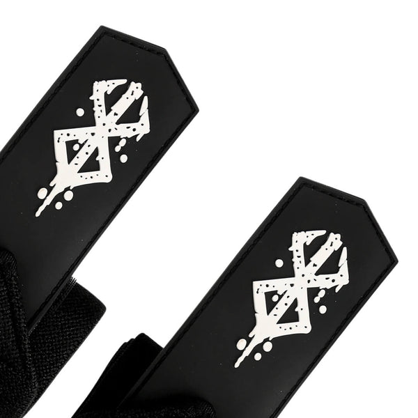 Close up of Berserk pattern from Berserk "Warrior" Wrist Wraps On Display. Perfect for weightlifting,and strength training. A unique anime gym gear gift for fitness lovers.
