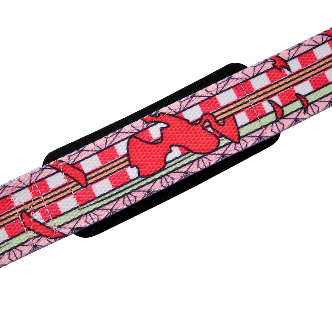 Detail of the wrist pad on the Kurenai lifting straps, black padding under crimson shapes and red-white checks