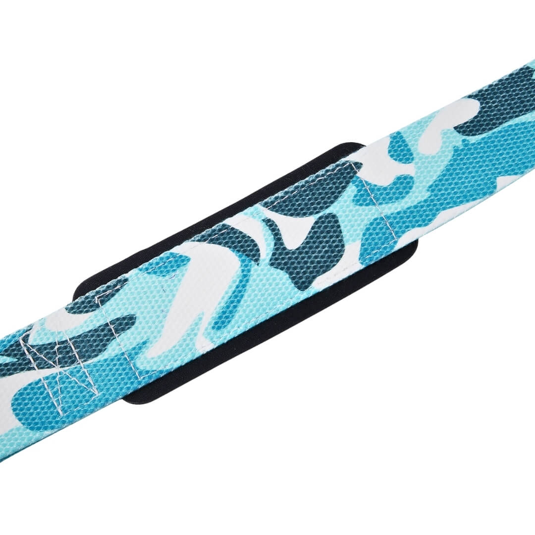 Detail of the wrist pad on the Deep Blue deadlift straps, black padding under sea camo with white box stitching