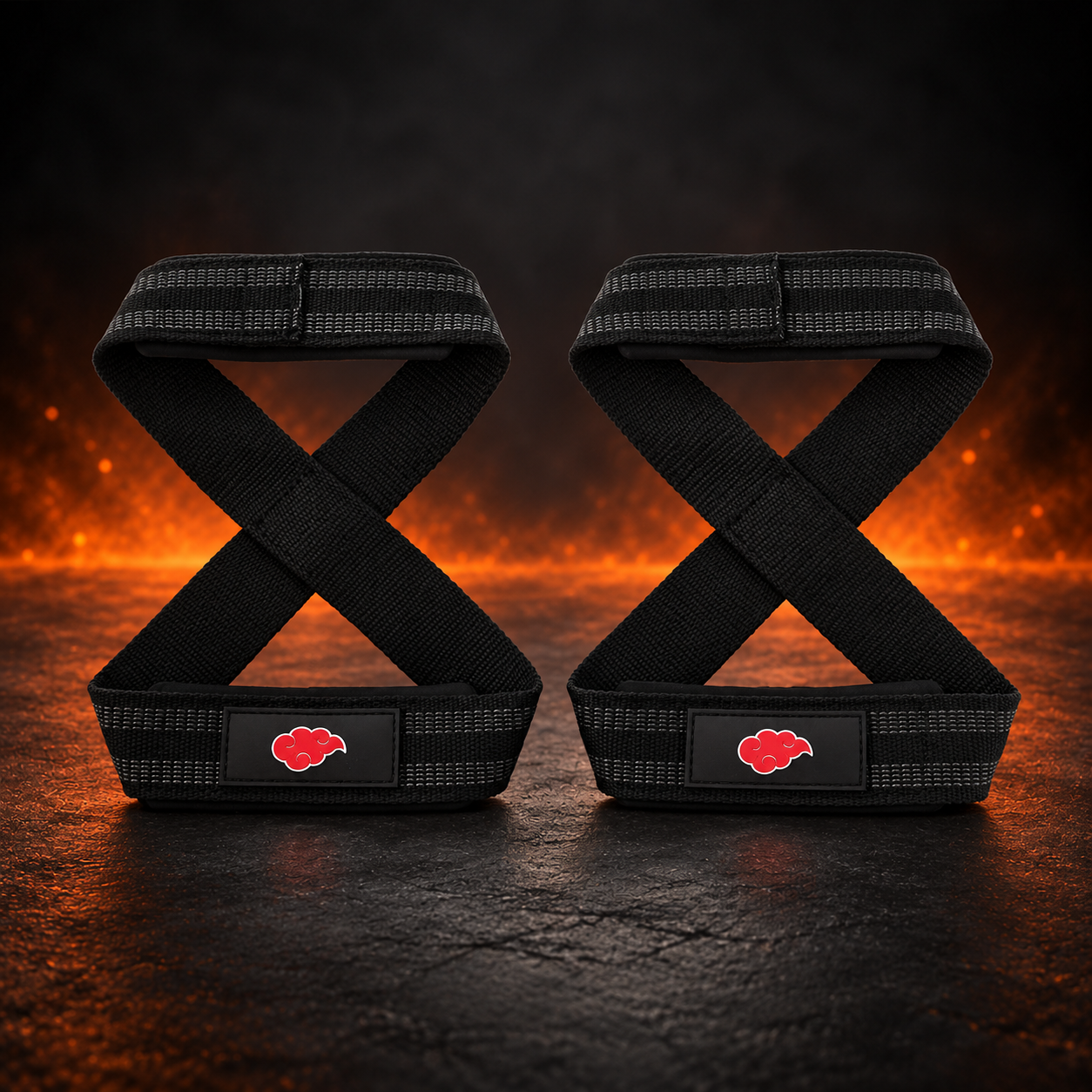 Pair of Dawn figure 8 lifting straps in black nylon with gray grip stripes and a red cloud patch on each strap