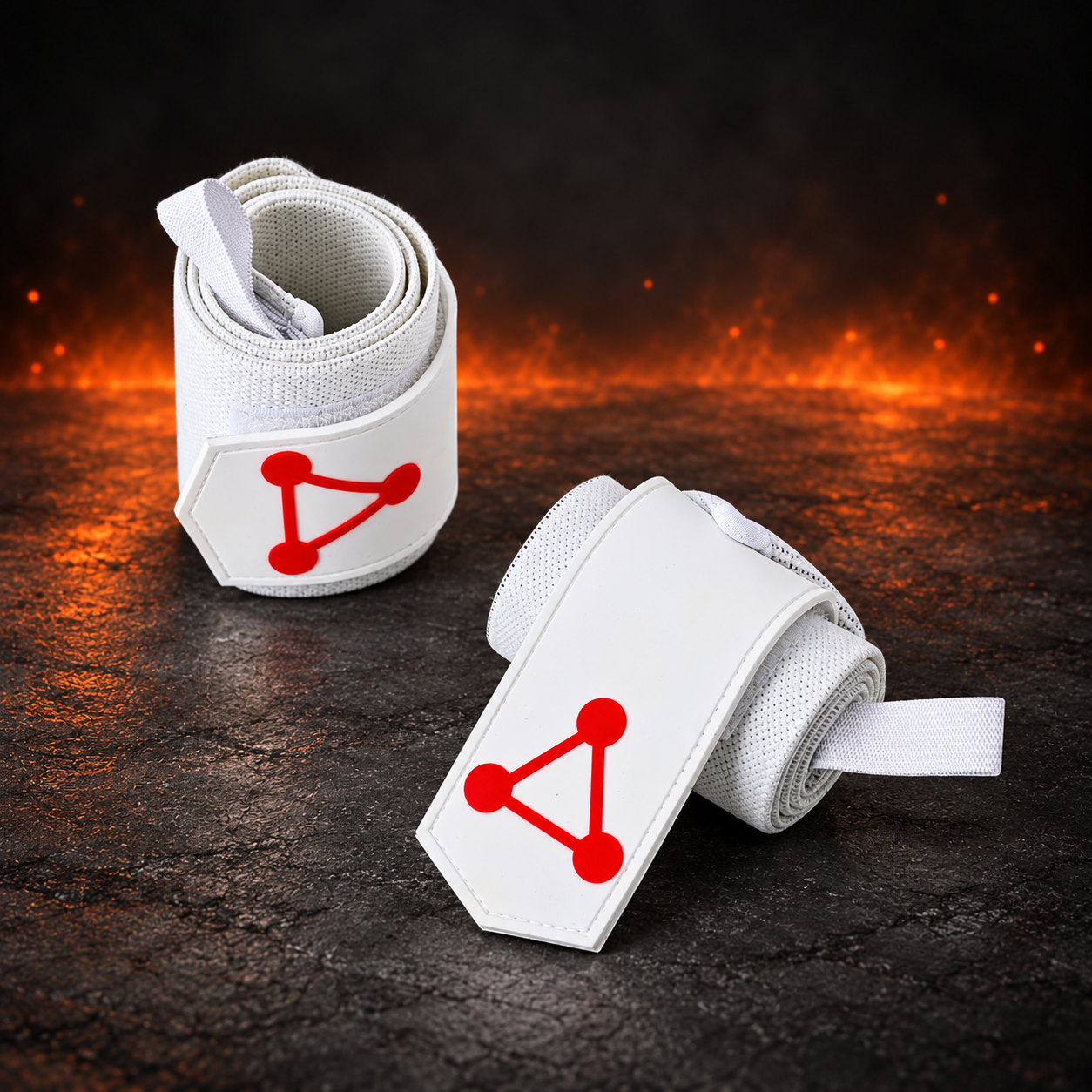 Pair of rolled Shikigami White wrist wraps, each white end patch marked with a red three-point triangle