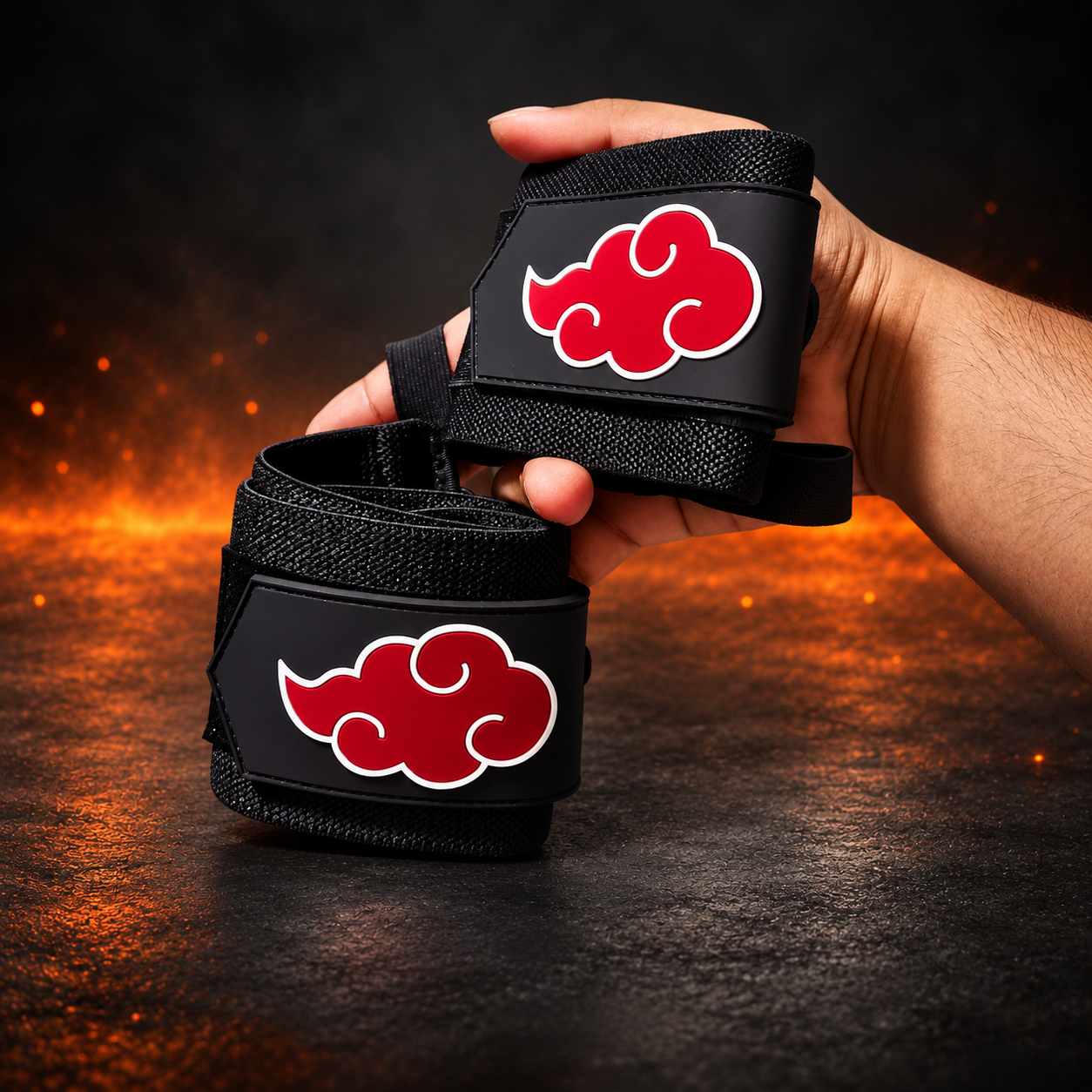 Black wrist wraps with raised red cloud patch