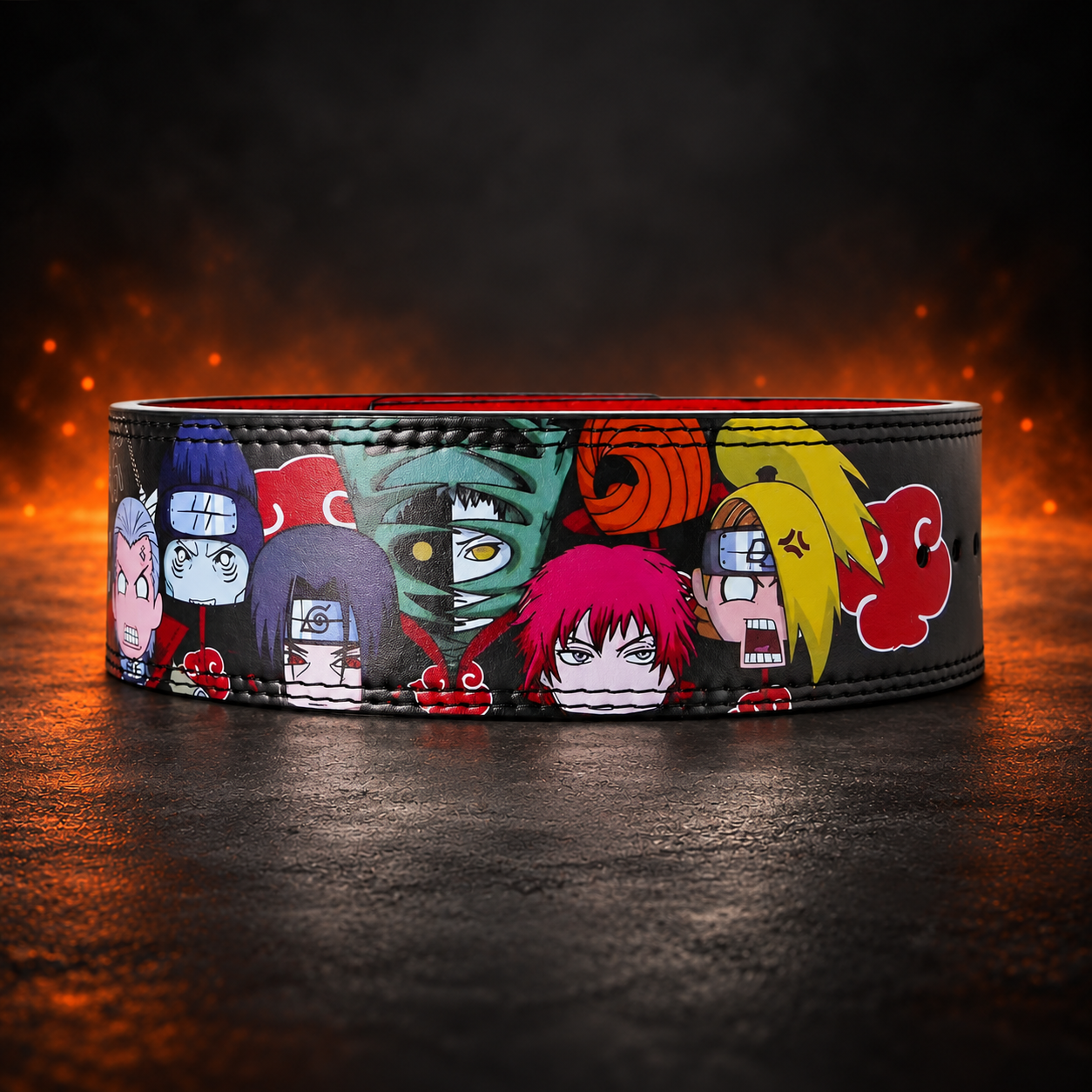 A multicolored powerlifting lever belt featuring character illustrations on a black background with a red interior.
