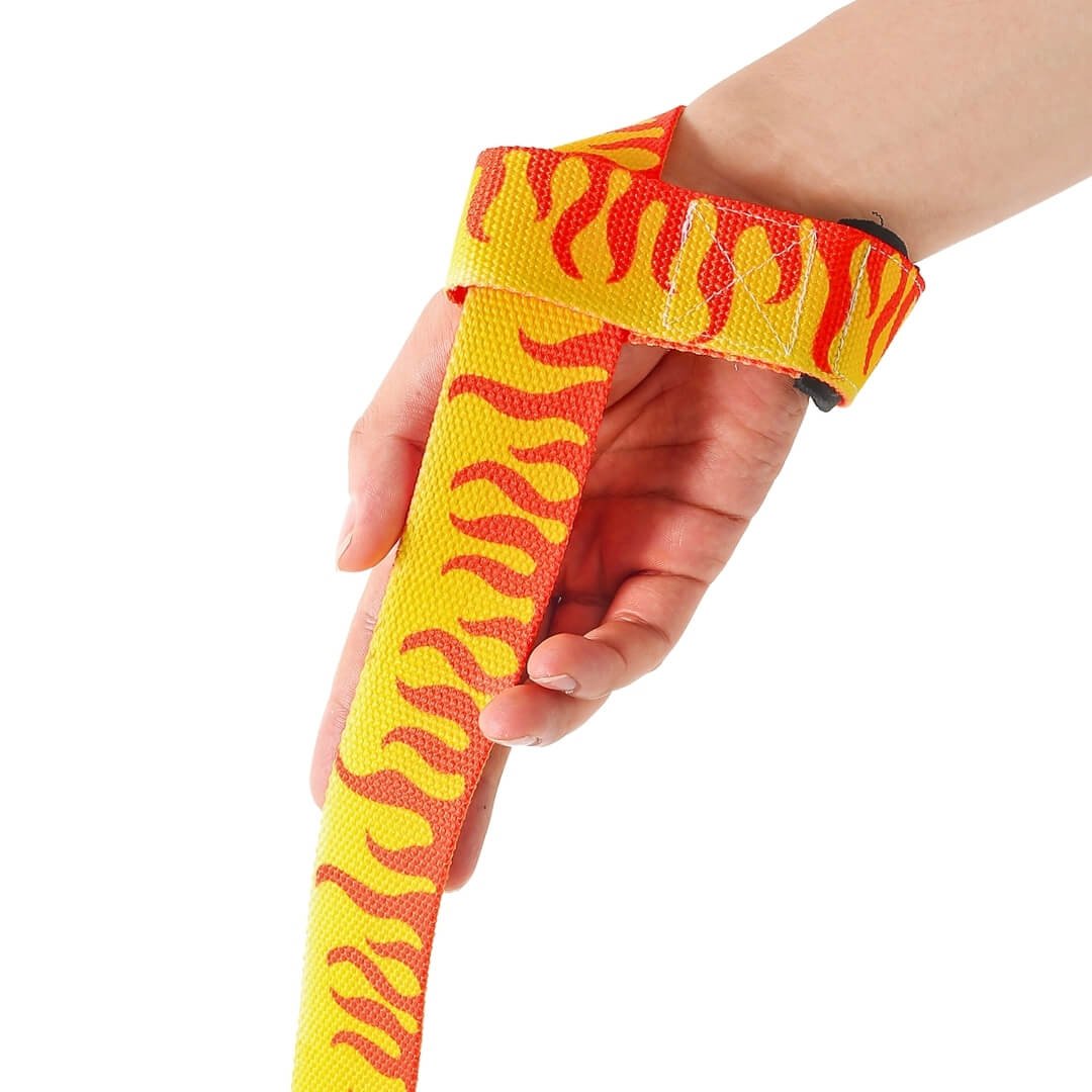 Kaen Edo lifting straps for deadlifts worn on the wrist, a yellow strap printed end to end with red flames