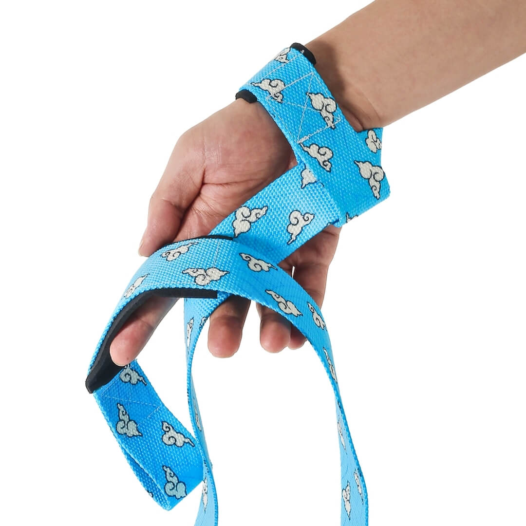 Edo lifting straps for deadlifts in the blue Kumo style, sky-blue webbing printed with white clouds, worn on the hand