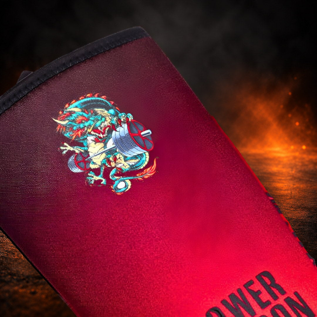 7mm knee sleeves, close-up of the full-color dragon gripping a barbell on the burgundy top.