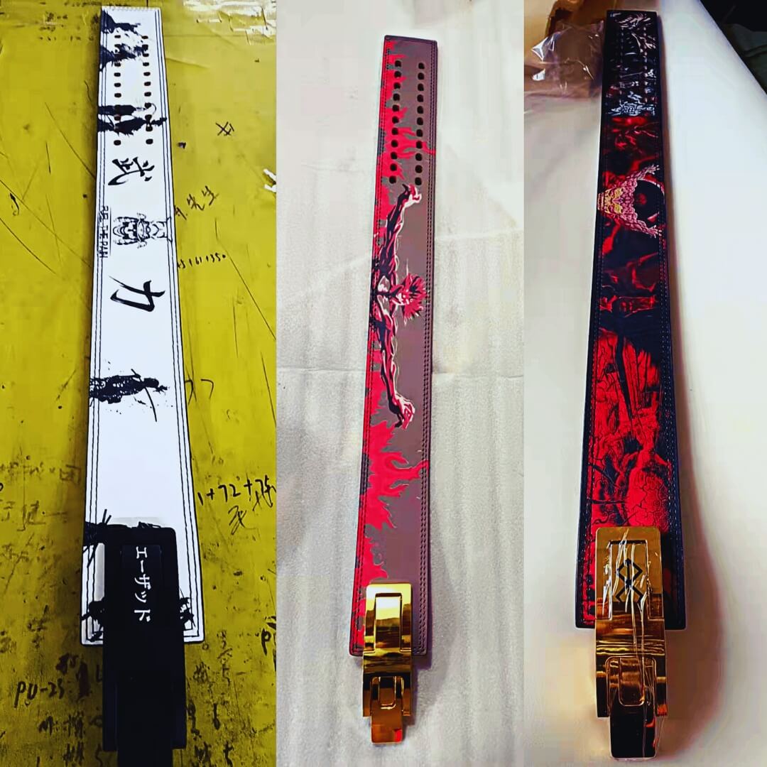 Custom powerlifting lever belts from past orders, one white with black kanji, two with red art and gold levers.
