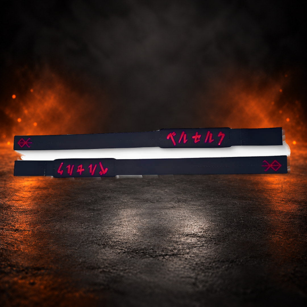 Lifting straps in black, pair laid flat with red script and a red mark on each.