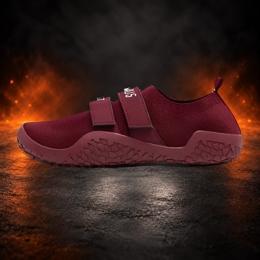 Deadlift slippers in wine red with matching straps and sole, side view.