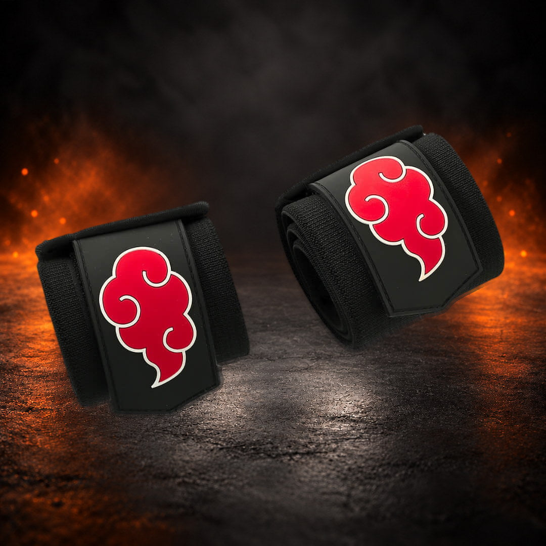 Powerlifting wrist wraps, rolled black pair with a raised red cloud on each closure patch.