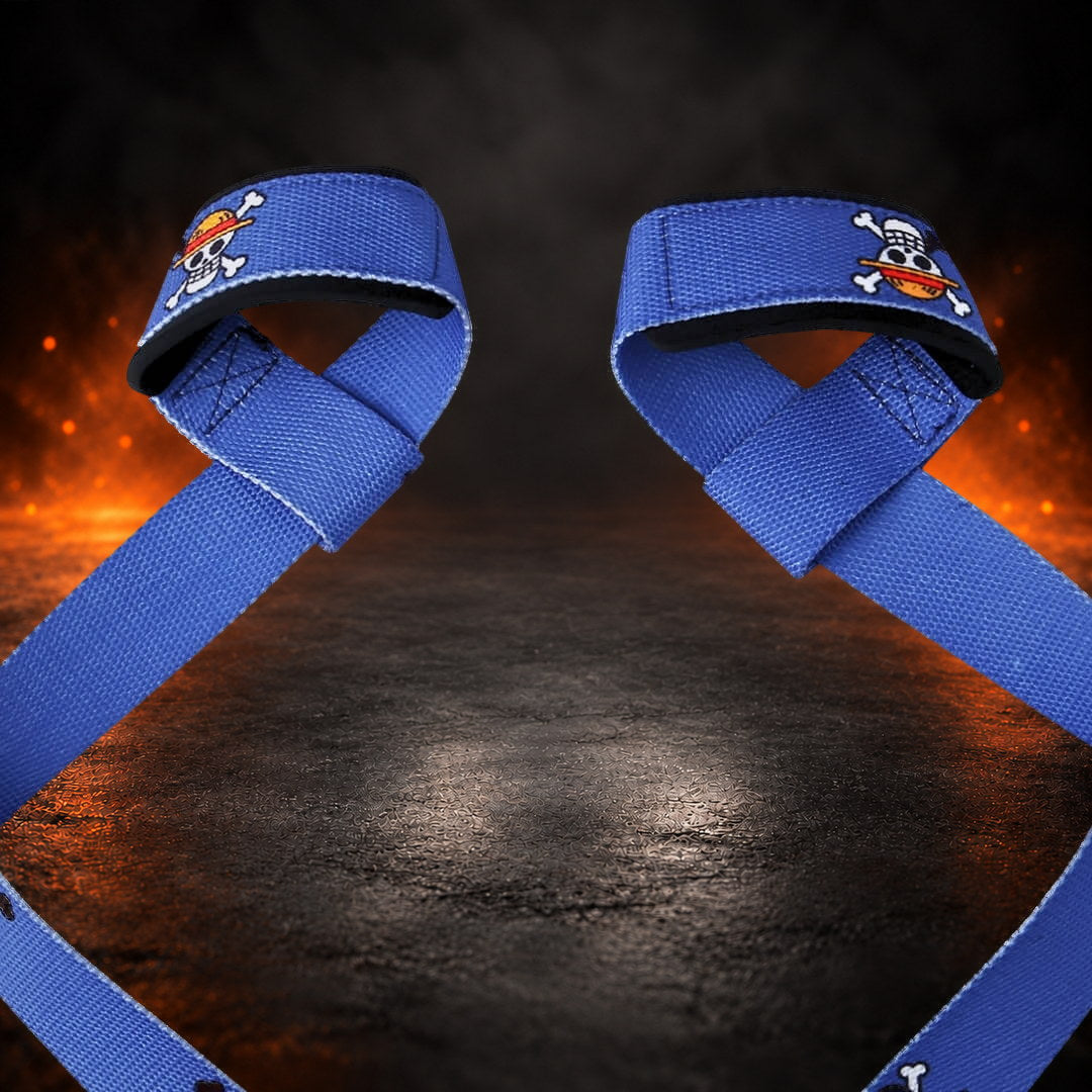 Lifting straps in royal blue, close-up of both padded loops with a small skull on each.