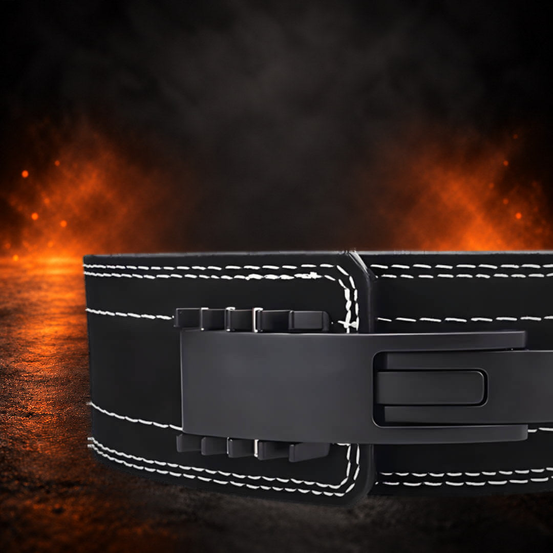 10mm lever belt in black suede, close-up of the closed matte black lever and white stitching.