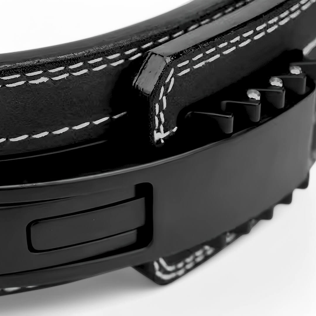 10mm lever belt in black, angled close-up of the black lever and white stitching on a white background.