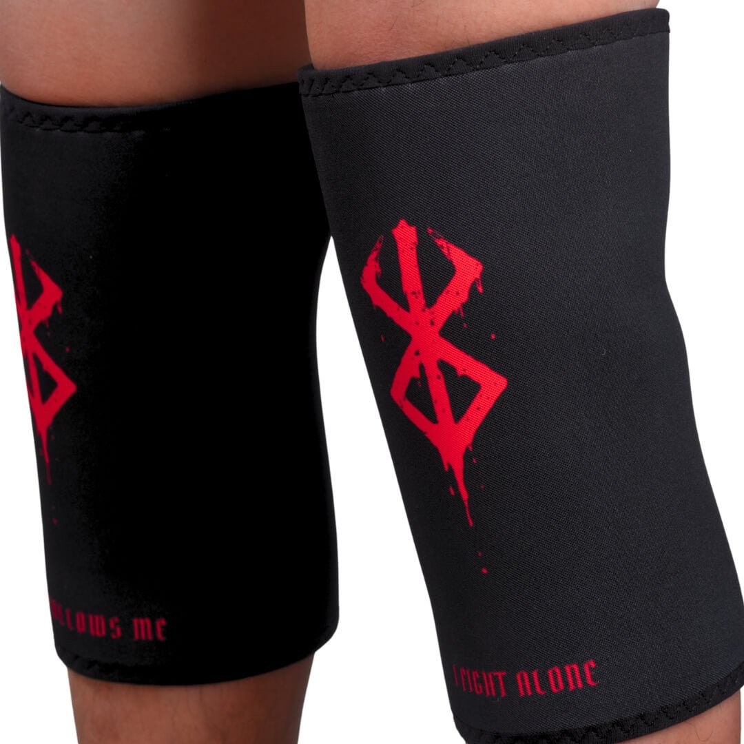 7mm stiff knee sleeves in black with dripping red marks, front view on an athlete's knees.