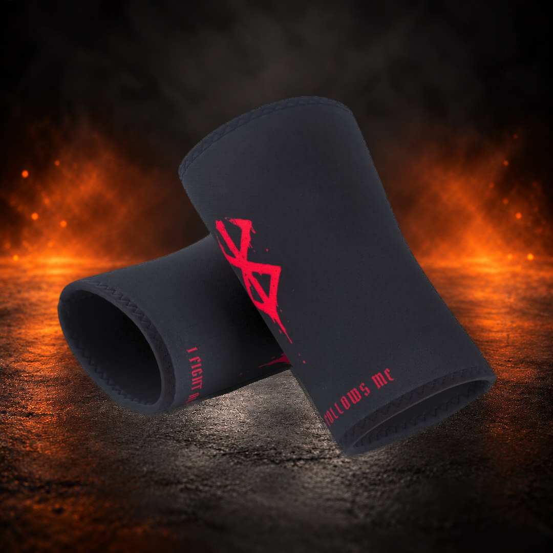 7mm stiff knee sleeves in black with a dripping red mark, one lying across the other.