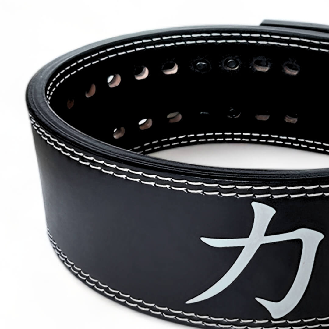 Close up view of leather Weightlifting Belt with kanji symbol for strength. USAPL approved Lever belt for powerlifting